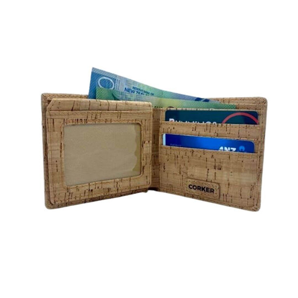 This vegan-friendly and natural cork wallet shouts style! Understated and practical, it may be the ultimate men's wallet. Made from the bark of the Cork Oak tree, it's lightweight and weather resistant. Super easy to keep clean, with a damp cloth. Smooth and flexible. Space for up to 6 cards. 2 additional slots, and 2 ID spaces. And completed with 2 note sections.