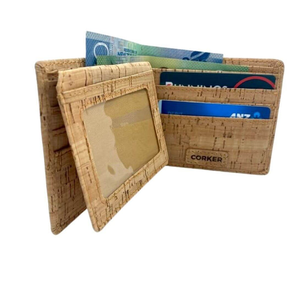 This vegan-friendly and natural cork wallet shouts style! Understated and practical, it may be the ultimate men's wallet. Made from the bark of the Cork Oak tree, it's lightweight and weather resistant. Super easy to keep clean, with a damp cloth. Smooth and flexible. Space for up to 6 cards. 2 additional slots, and 2 ID spaces. And completed with 2 note sections.