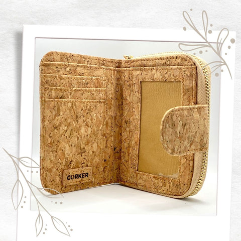 natural vegan-friendly cork purse is neither too big nor too small! Featuring 3 designated card pockets and an additional 4 spaces for extra cards, including the all-important clear ID slot. It also has 2 large interior slip pockets ideal for any notes. Completed with a zip compartment for any loose coins. This quality eco cork purse is hard-wearing yet soft and tactile.