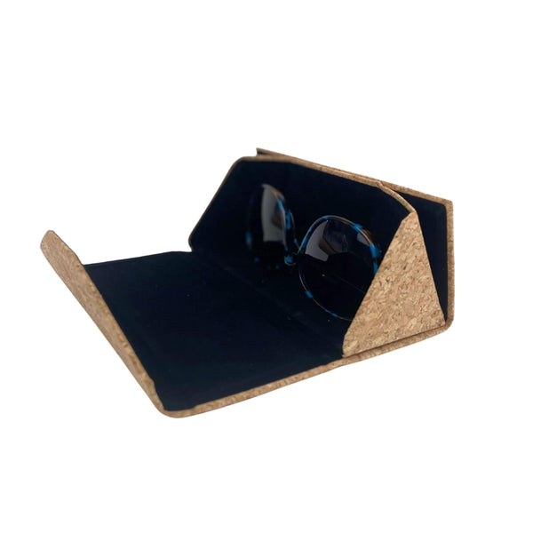 The perfect eco-friendly and durable solution to keep your sunglasses and glasses safe from any damage or dust.  Practical and stylish, and made with premium natural vegan-friendly cork. The ideal way to keep your glasses in perfect condition. You can fold this case for space-saving storage, and it also features a magnetic closure for ease of opening. Watch our Insta video to see how effortless these cases are!  Cork is eco-friendly, very soft, flexible, and durable and weather (and beach) resistant! 