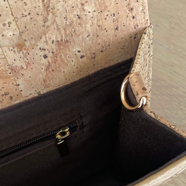 The perfect, natural eco cork handbag to complete many of your outfits. Styled in a timeless classic envelope clutch design with a stunning butterfly etch. This vegan-friendly bag will look equally great on a night on the town, a day at the races, a family wedding or even to the office.