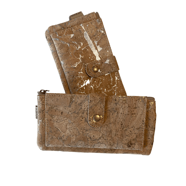 This perfectly sized natural vegan-friendly cork purse is neither too big nor too small! Featuring 8 designated card pockets and additional space for extra cards or cash.  Completed with a zip compartment for loose coins. And a press stud closure. This quality eco-cork purse is hard-wearing yet soft and tactile. Easy to keep clean; simply wipe with a damp cloth. 