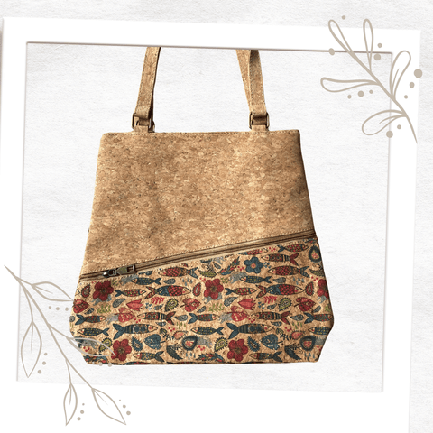 Enjoy the sea everyday!  A playful print on this versatile, sustainable cork tote handbag is sure to be a conversation starter! This natural premium eco cork tote bag is taken to the next level with a colourful print. Featuring 2 handy large zipped pockets on the front and rear of the bag. Spacious interior with 2 small pockets and a small zipper pocket to fit your daily items.  Made with PETA approved vegan cork. 