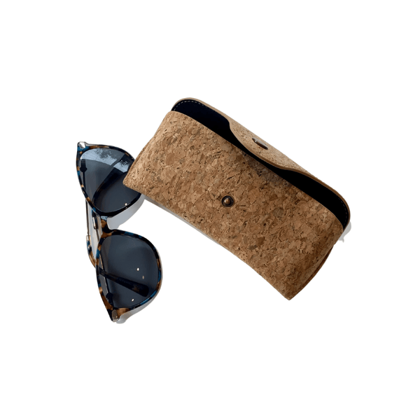 This unique cork case is perfect to keep your glasses safe from any damage or dust. Featuring a snap buckle closure and natural cork fabric.  Protect your sunglasses with this eco, vegan glasses case.   Cork is eco-friendly, very soft, flexible, and durable! Oh and did we mention how easy it is to keep clean. Just a dampened cloth and a little liquid soap!